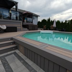 image of a multilevel deck built from a rendering designed by Aurora Exteriors Inc.