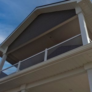 Second Level Balcony with White Aluminum Railings with Glass Inserts by Aurora Exteriors Inc